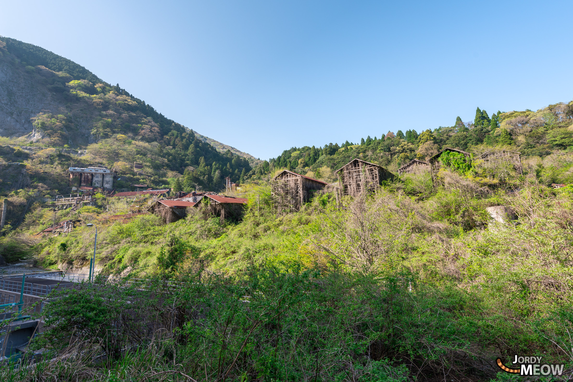 Overgrown Shiraishi Mine ruins in Kansai, Japan, the abandoned White Labyrinth industrial site.