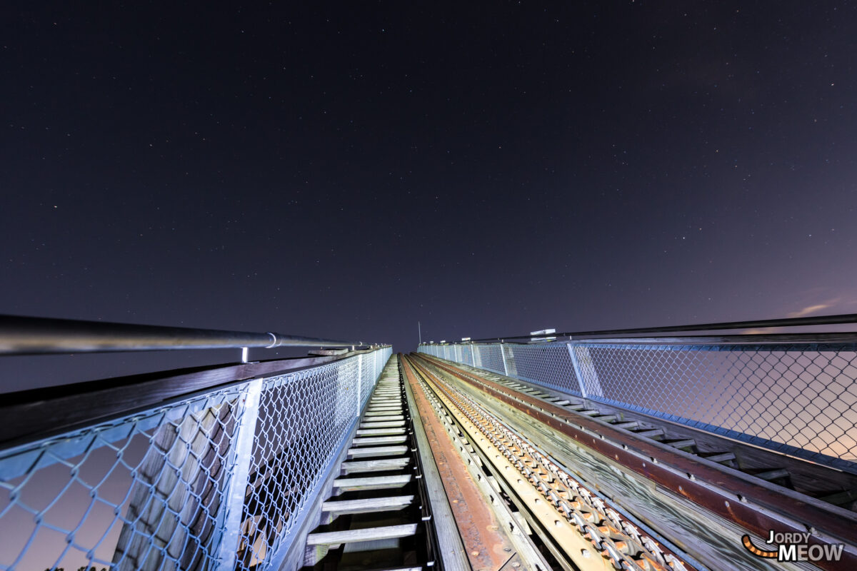 Abandoned Nara Dreamland Bridge: Haunting decay and memories in eerie darkness.