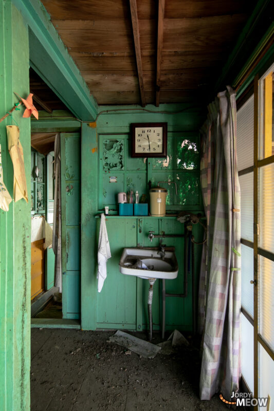 Vibrant turquoise clinic, natures embrace, hidden forest.