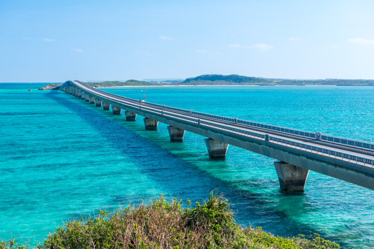 Miyako Island bridge curving over turquoise ocean water in Okinawa, Japan